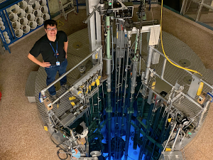 Mark Korol stands next to the University of Missouri reactor pool