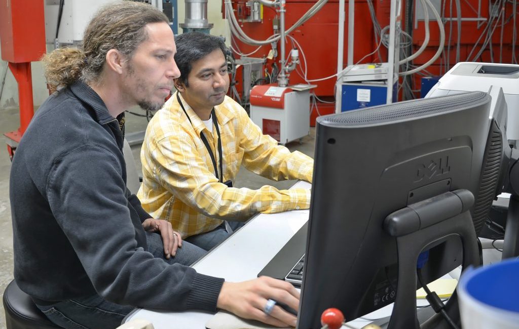 Two men at a computer