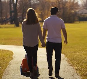 Nicole walks with her family.