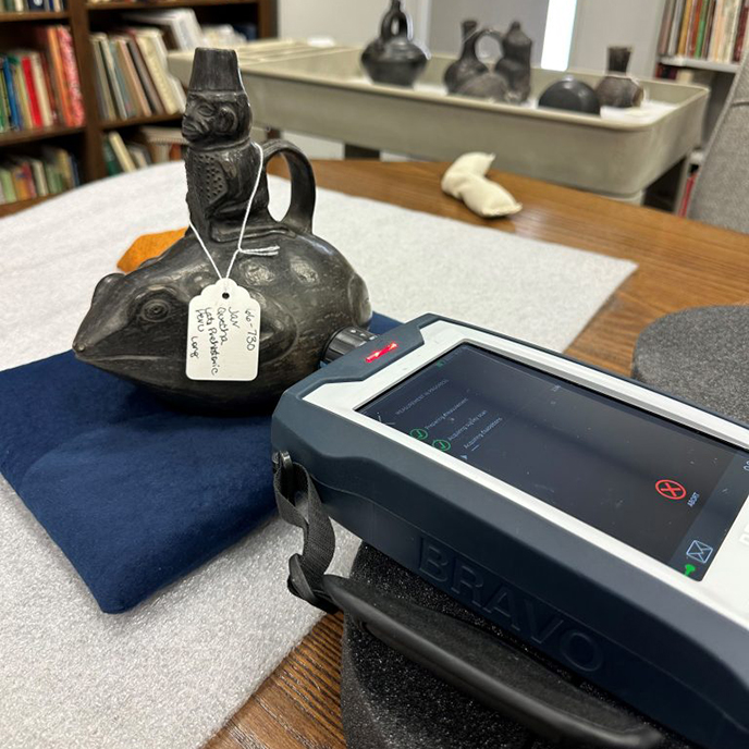 A pre-Hispanic pottery vessel from Peru depicting a man riding a frog is examined by Raman spectroscopy.