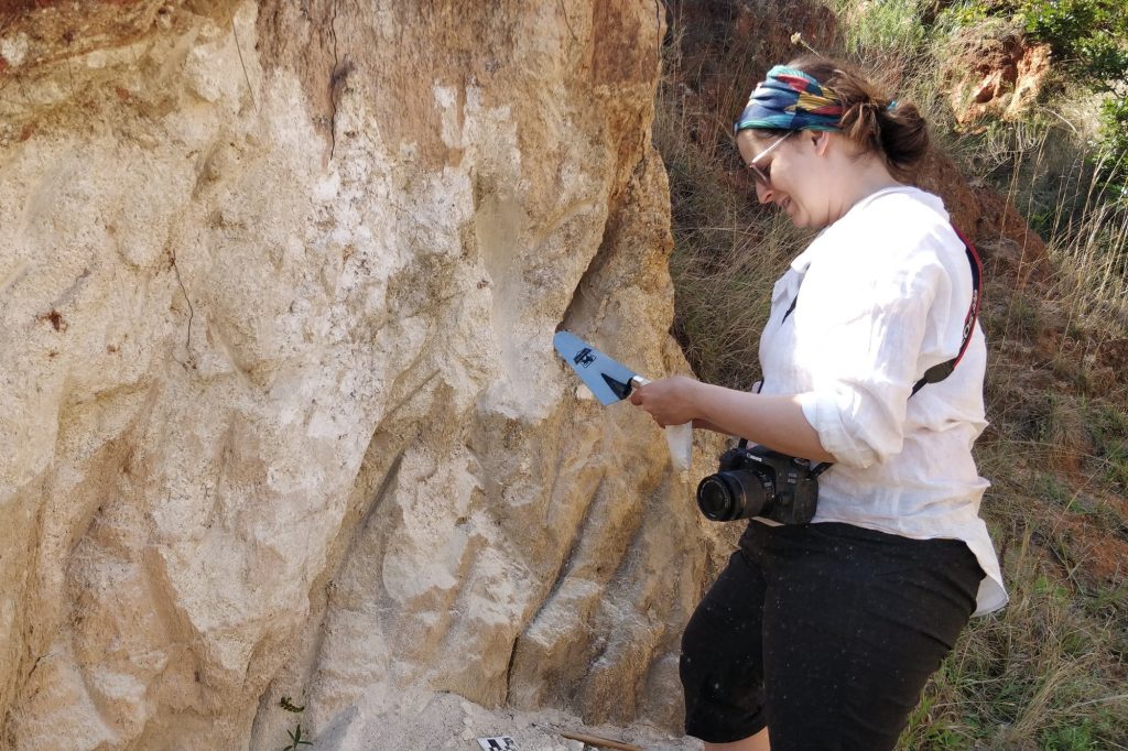 University of Missouri scientist Brandi L. MacDonald collects ochre and clay raw materials in Eswatini, southern Africa, for the study.