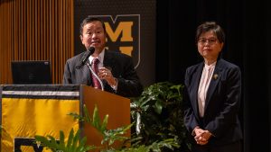 President Mun Choi introduces Dr. Harriet Kung